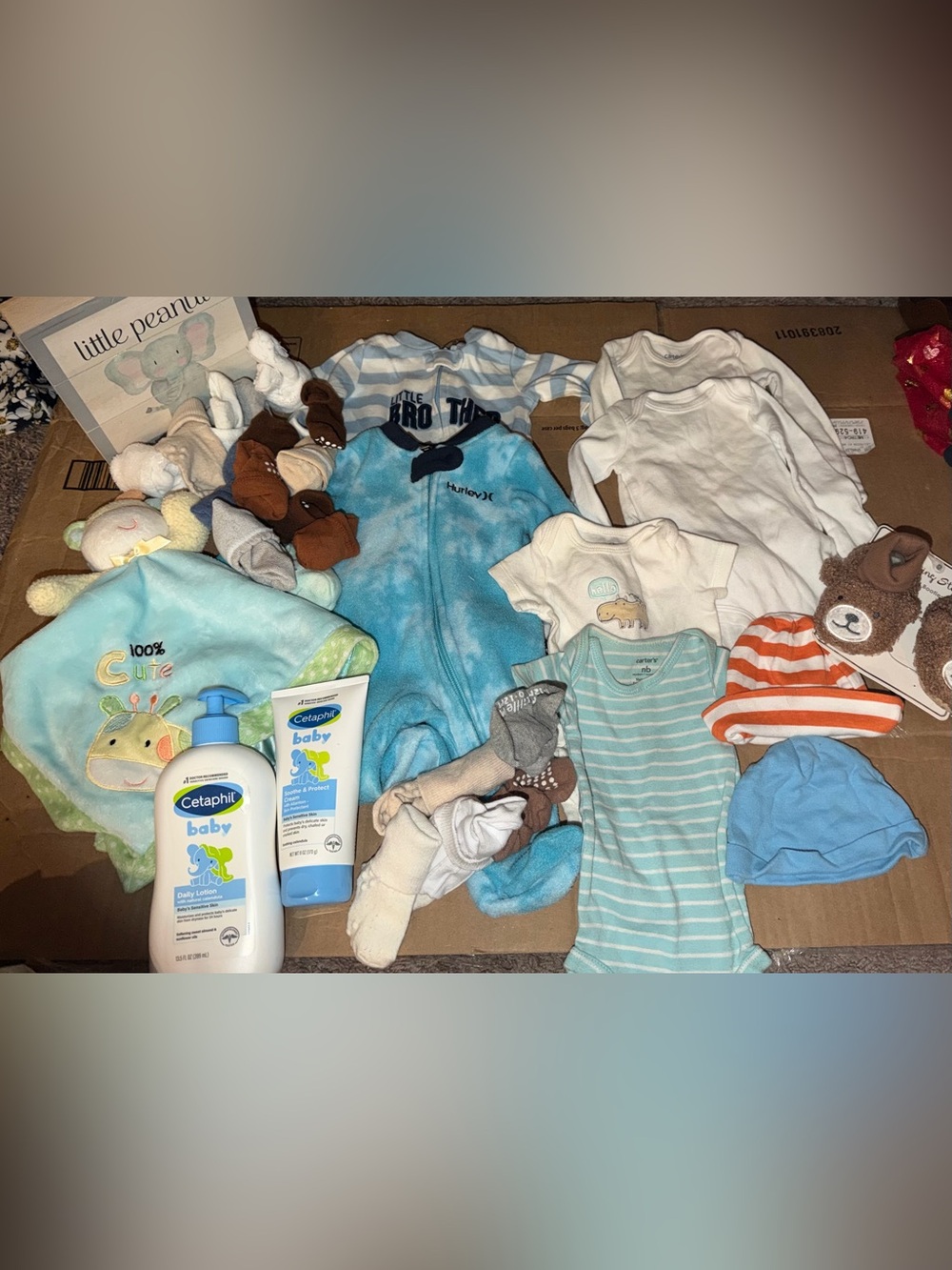 Lot of baby boy clothes, socks, etc